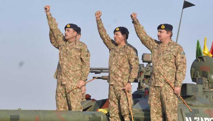 COAS General Asim Munir (left) pictured on top of a Pakistan Army tank during his visit of a field training exercise near Narowal and Sialkot in this image released on December 3, 2024. — ISPR