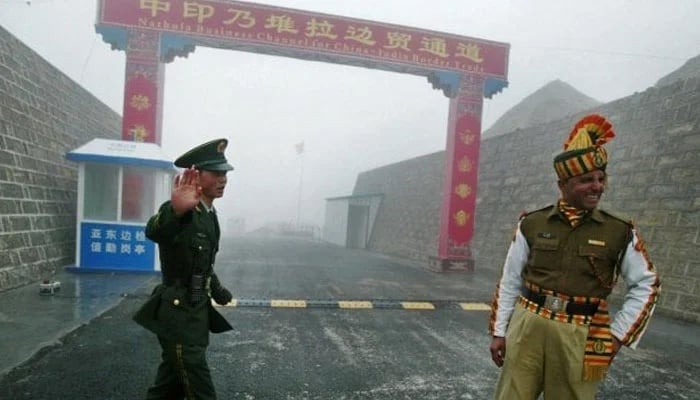 A representational image showing Chinese and Indian security personnel at Indo-China border. — AFP/File