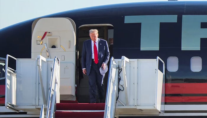 US President-elect Donald Trump arrives prior to meeting with President Joe Biden and members of Congress in Washington, at Joint Base Andrews in Maryland, US, November 13, 2024. — Reuters