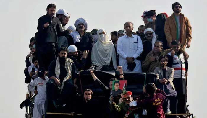 Bushra Bibi, wife of jailed former prime minister Imran Khan, and leaders of Khans party Pakistan Tehreek-e-Insaf (PTI) attend a rally demanding his release, in Islamabad, Pakistan, November 26, 2024. — Reuters