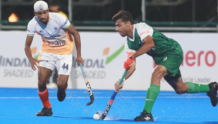 Players of India (L) and Pakistan pictured during the final of the mens Junior Hockey Asia Cup on December 4, 2024 in Muscat, Oman. — X/@asia_hockey