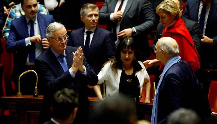 French Prime Minister Michel Barnier reacts after the result of the vote on the first motion of no-confidence against the French government, tabled by the alliance of left-wing parties the Nouveau Front Populaire (New Popular Front - NFP), after the use by French government of the article 49.3, a special clause in the French Constitution, to push the budget bill through the National Assembly without a vote by lawmakers, at the National Assembly in Paris, France, December 4, 2024. — Reuters