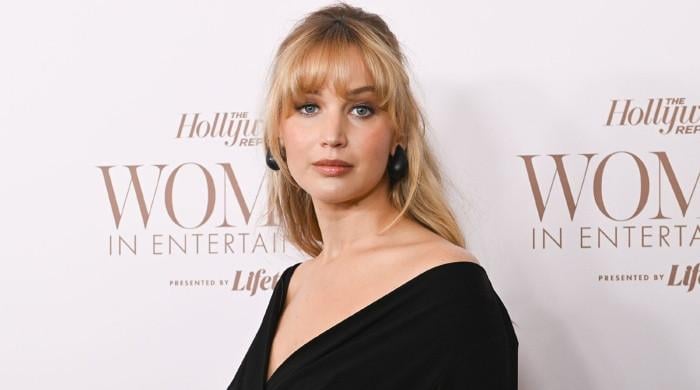 Jennifer Lawrence child bump steals the present in beautiful black gown