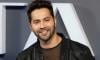 Varun Dhawan carries out father duties amid promotion of new movie