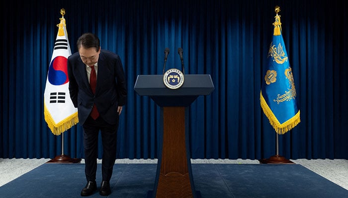 South Korean President Yoon Suk Yeol bows while delivering an address to the nation at the Presidential Office in Seoul, South Korea, December 7, 2024. — Reuters