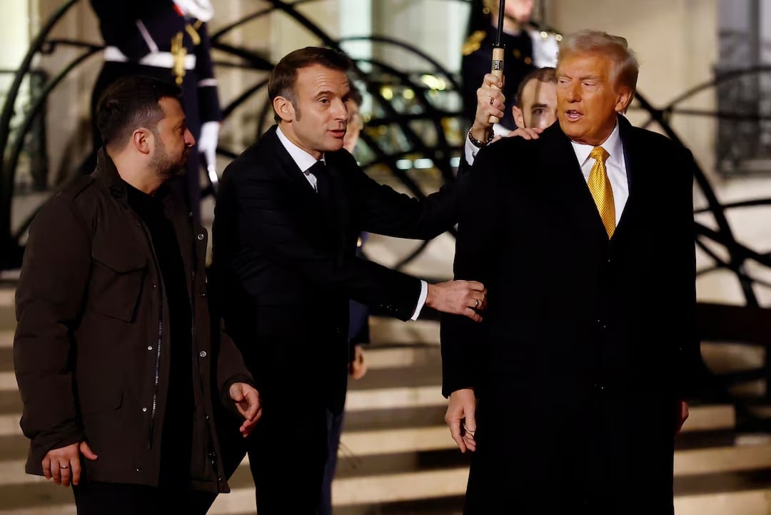 French President Emmanuel Macron accompanies US President-elect Donald Trump and Ukraines President Volodymyr Zelensky as they leave after a trilateral meeting at the Elysee Palace, in Paris, France, December 7, 2024. — Reuters