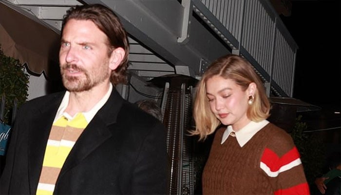 Gigi Hadid and Bradley Cooper in matching sweaters after Santa Monica dinner.