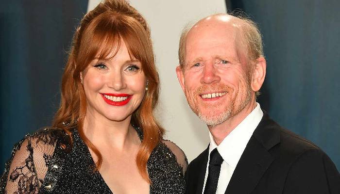 The Jurassic World star recalled spending her childhood on sets with Ron Howard