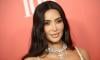 Kim Kardashian shows off fashionable boot cast amid broken foot