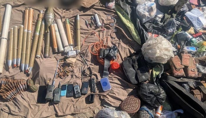 Weapons, ammunition and explosives recovered from terrorists. — ISPR