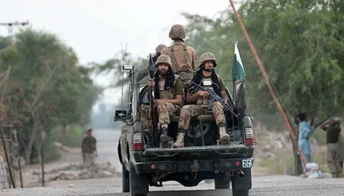 Pakistan Army personnel travelling in a military vehicle in this undated picture. — AFP/File