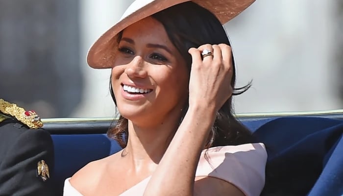 The Duchess of Sussex appeared radiant in a pale pink fitted dress