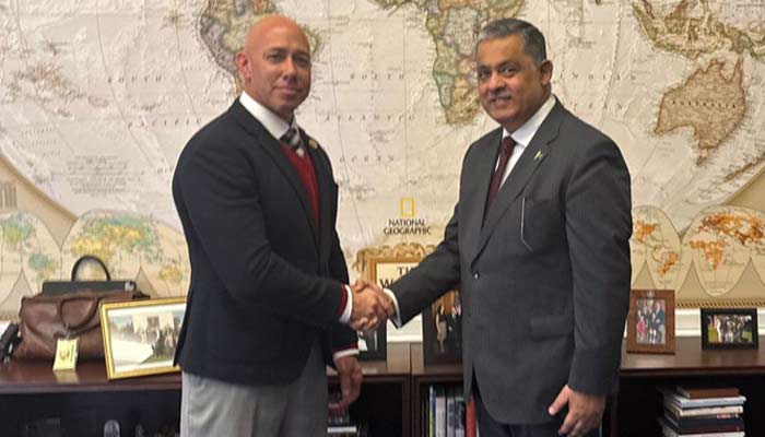 An undated image shows Pakistans Ambassador to US Rizwan Saeed Sheikh (right) poses for a photo with Chairman of the House Foreign Affairs Committee Rep Brian Mast in Washington, US. — X/@AmbRizSaeed