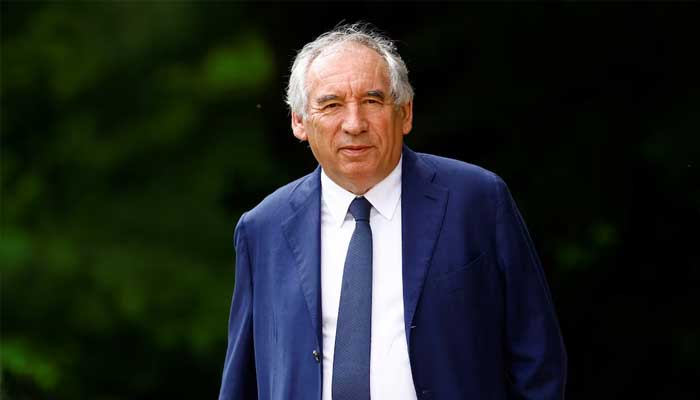 Francois Bayrou, leader of French centrist party MoDem (Democratic Movement) walks outside the Elysee Palace on the day President Emmanuel Macron met party leaders for talks, in Paris, France, August 23, 2024. — Reuters