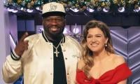 Kelly Clarkson Gets ‘flirty’ With 50 Cent: ‘She's SO Charmed By Him'