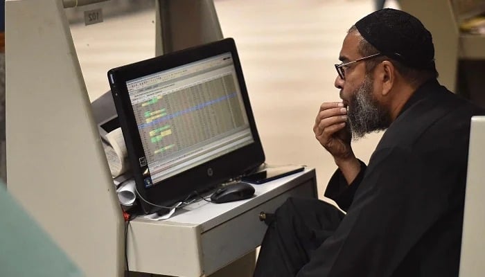 Trader monitors stock prices at Pakistan Stock Exchange in Karachi, on Thursday, December 5, 2024. — INP