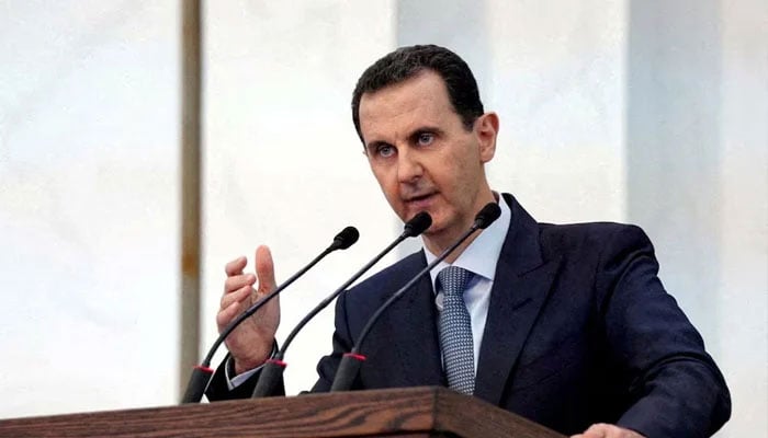 Syrias former president Bashar al-Assad addresses members of parliament in Damascus, Syria in this handout released by SANA on August 12, 2020. — AFP