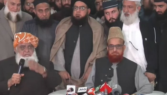 JUI-F Chief Maulana Fazlur Rehman (left) and Mufti former chairman Ruet-e-Hilal Muneebur Rehman addressing a press conference on December 16, 2024. — Screengrab via YouTube/Geo News