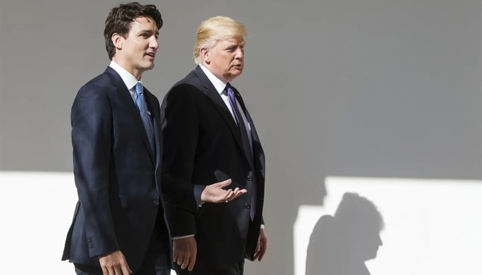 US President-elect Donald Trump (right) and Canadian Prime Minister Justin Trudeau. —AFP/ File