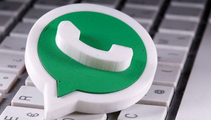 A 3D printed WhatsApp logo is placed on the keyboard in this illustration taken April 12, 2020. — Reuters