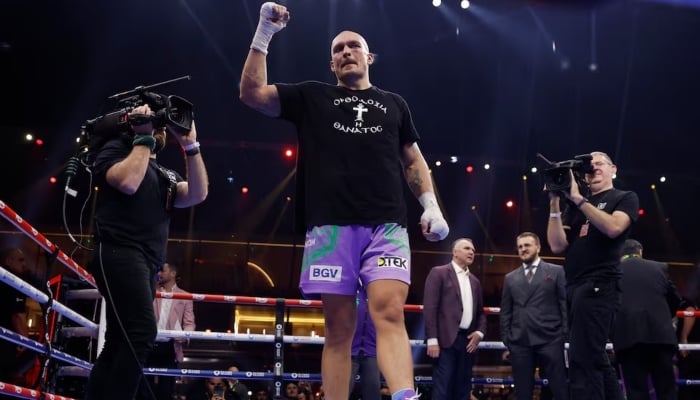 Usyk celebrates after retaining the Heavyweight World Title, Kingdom Arena, Riyadh, Saudi Arabia, December 22, 2024. — Reuters