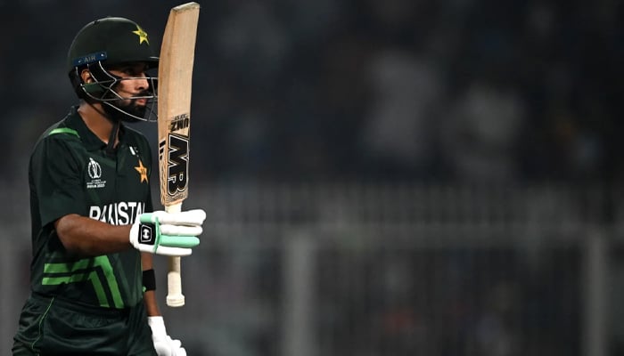 Pakistans Abdullah Shafique raising his bat during a match against Bangladesh during the 2023 Cricket World Cup on October 31, 2023. — AFP