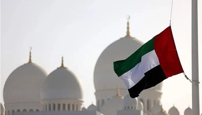 The UAEs flag flies outside the Sheikh Zayed Grand Mosque in Abu Dhabi. — AFP/File