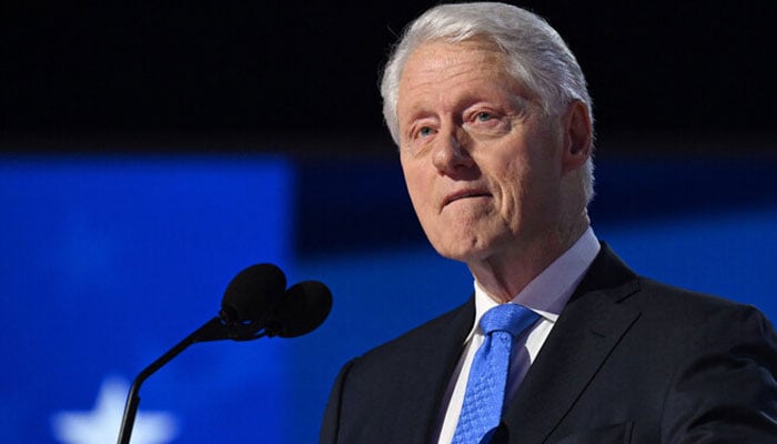 Former US President Bill Clinton speaks on the third day of the Democratic National Convention (DNC) at the United Center in Chicago, Illinois, on August 21, 2024. Former US President Bill Clinton has been hospitalized with a fever, an aide to the former president announced on December 23, 2024. — AFP