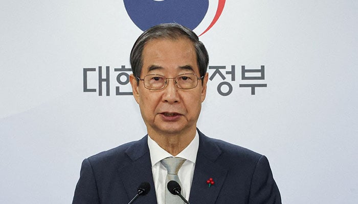 Acting South Korean President and Prime Minister Han Duck-soo delivers an address to the nation at the government complex in Seoul, South Korea on December 14, 2024. — Reuters