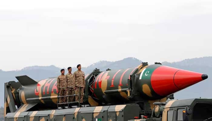 Pakistani military personnel stand beside a Shaheen III surface-to-surface ballistic missile during Pakistan Day military parade in Islamabad on March 23, 2019. — Reuters