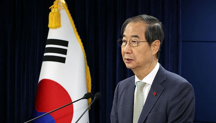 Han Duck-soo delivers an address to the nation at the government complex in Seoul, South Korea, December 14, 2024. — Reuters