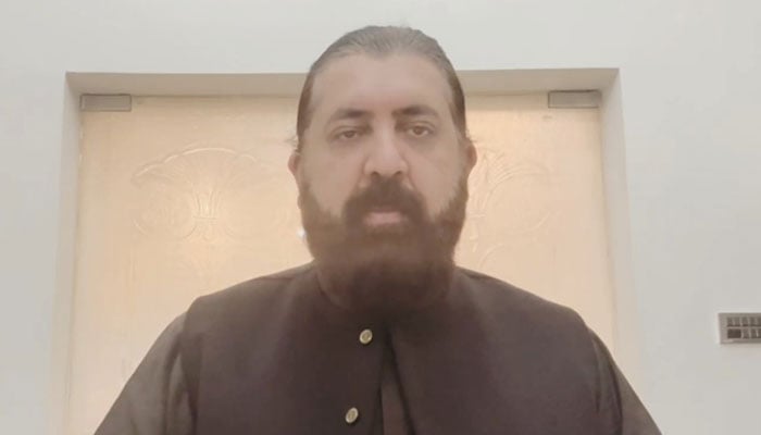 PTIs Information Secretary Sheikh Waqas Akram speaks during a video message on December 22, 2024. — Screengrab via X@SheikhWaqqas