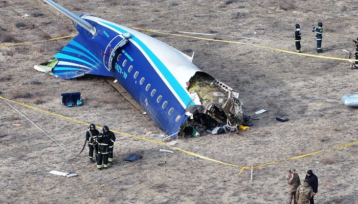 A drone view shows emergency specialists working at the crash site of an Azerbaijan Airlines passenger plane near the city of Aktau, Kazakhstan December 25, 2024. — Reuters