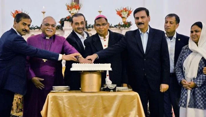 Chief of Army Staff (COAS) General Syed Asim Munir (third from left) cuts cake to celebrate Christmas at St. Joseph’s Catholic Cathedral Church on December 25, 2024. — ISPR