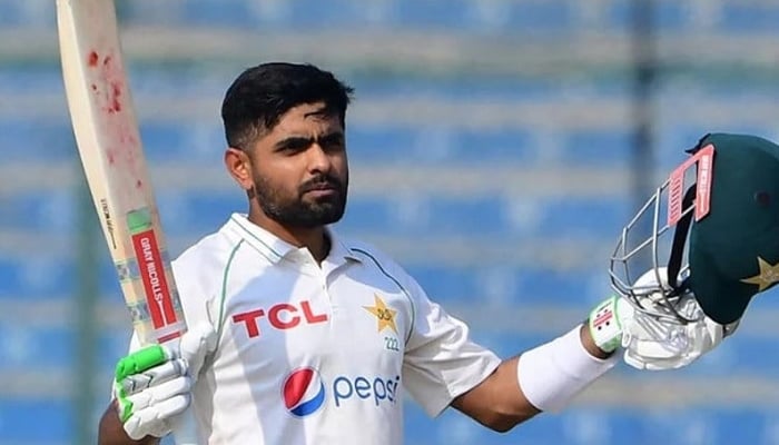 Pakistans Babar Azam raising his bat after a milestone. — AFP/File