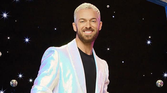 ‘DWTS’ Artem Chigvintsev makes first appearance with son after divorce