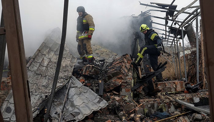 Firefighters work at the site of residential buildings hit by a Russian drone strike, amid Russias attack on Ukraine, in Kharkiv, Ukraine December 25, 2024. — Reuters