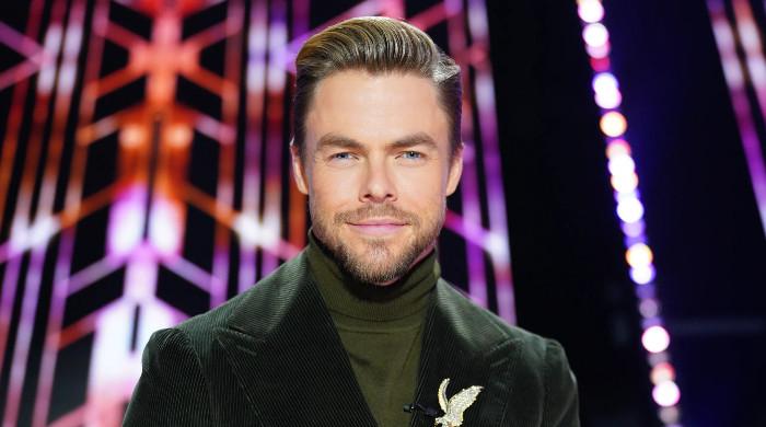 Derek Hough’s unique Christmas gift to his cat, ‘,000’