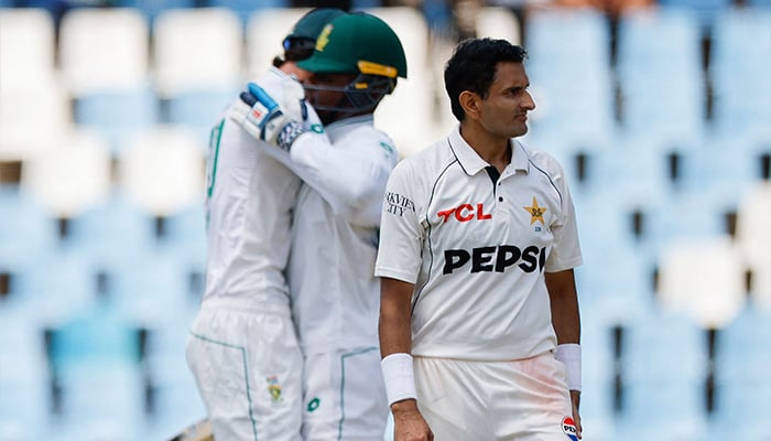 Pakistans Mohammad Abbas (C) reacts as South Africas Marco Jansen (L) and Kagiso Rabada (R) celebrate South Africa winning the match during the fourth day of the first Test match between South Africa and Pakistan at SuperSport Park in Centurion on December 29, 2024. — AFP