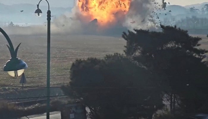 Jeju Air aircraft flight 7C2216 is engulfed in flames as crashes after landing at Muan International Airport in Muan, South Korea December 29, 2024 in this screengrab obtained from video. — Reuters