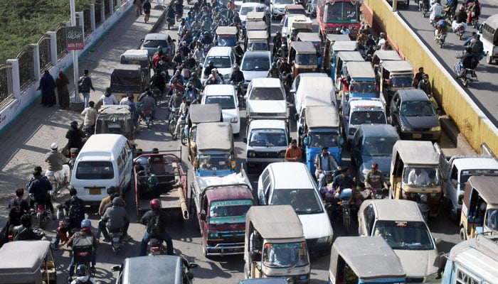 A view of massive traffic jam at Drig Road due to MWM sit-in in Karachi on December 28, 2024. — Online