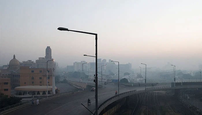 A general view of a business area amid smog and air pollution on a morning in Karachi, on November 14, 2024. — Reuters