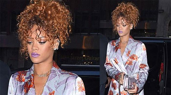 Rihanna toasts new yr with a gown and 0 alcohol