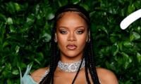 Rihanna Claps Back At Troll Insulting Her Forehead Over Album Delay 