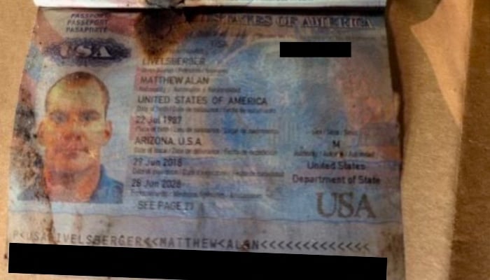 A damaged US passport of Matthew Livelsberger, who drove the Tesla Cybertruck that exploded outside the Trump International Hotel, is seen in Las Vegas, Nevada, US, on January 2, 2025. —Reuters