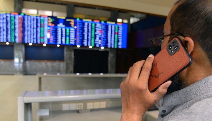 Broker is busy in trading at Pakistan Stock Exchange in Karachi on Wednesday, January 1, 2025. — PPI