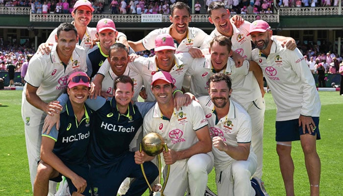 Australia players pose with the Border-Gavaskar Trophy after winning the fifth Test match and series against India at the Sydney Cricket Ground on January 5, 2025. — Reuters