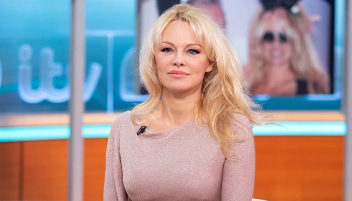 Pamela Anderson dresses up in black before Golden Globes