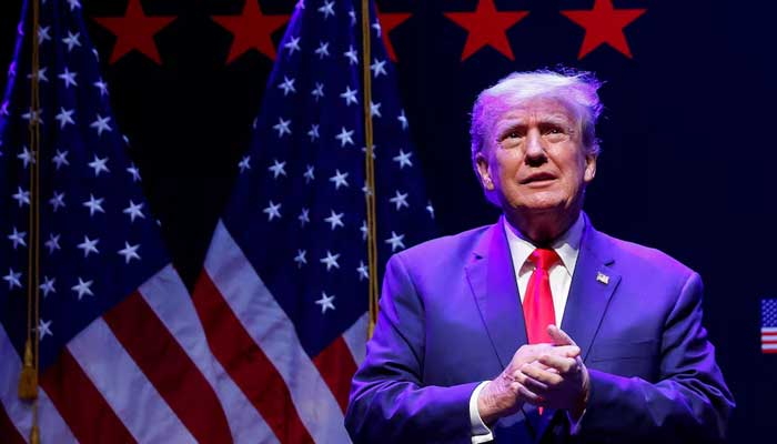 Donald Trump takes the stage to deliver remarks on education as he holds a campaign rally with supporters, in Davenport, Iowa, US, March 13, 2023. — Reuters