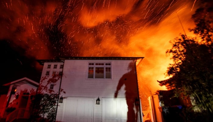 The wind whips embers as the Palisades fire burns during a windstorm on the west side of Los Angeles, California, US, on January 8, 2025. — Reuters